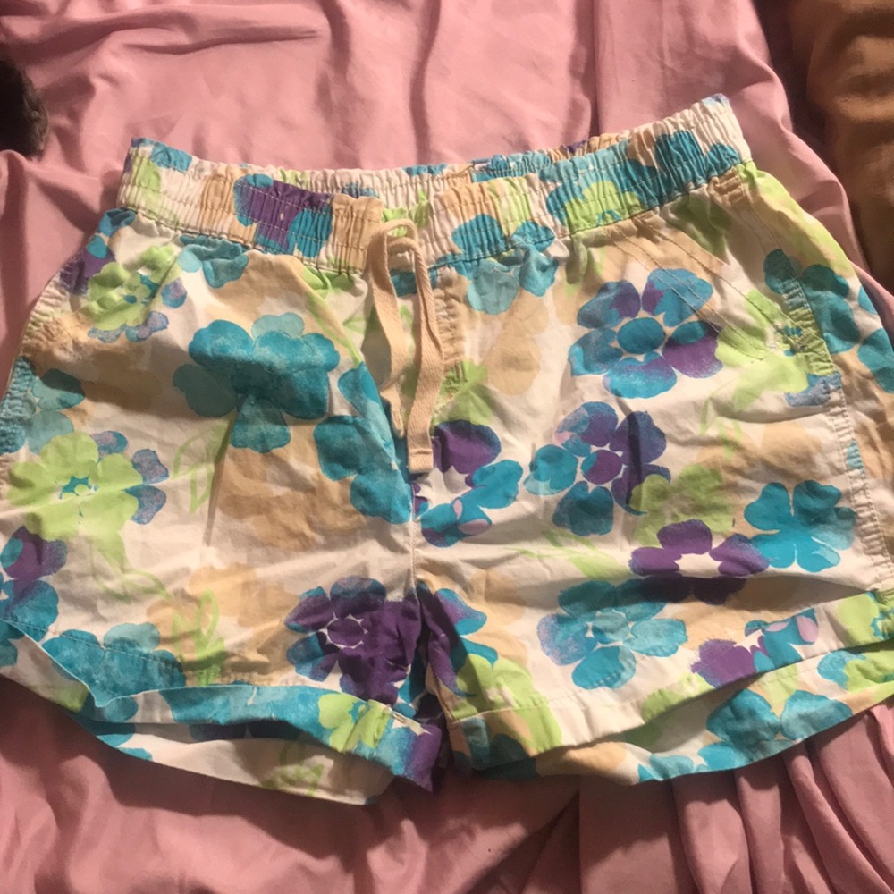 white shorts with purple,blue,green and tan design